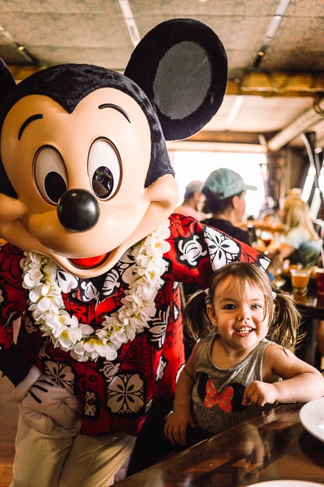 toddler with Mickey Mouse at Ohana restaurant
